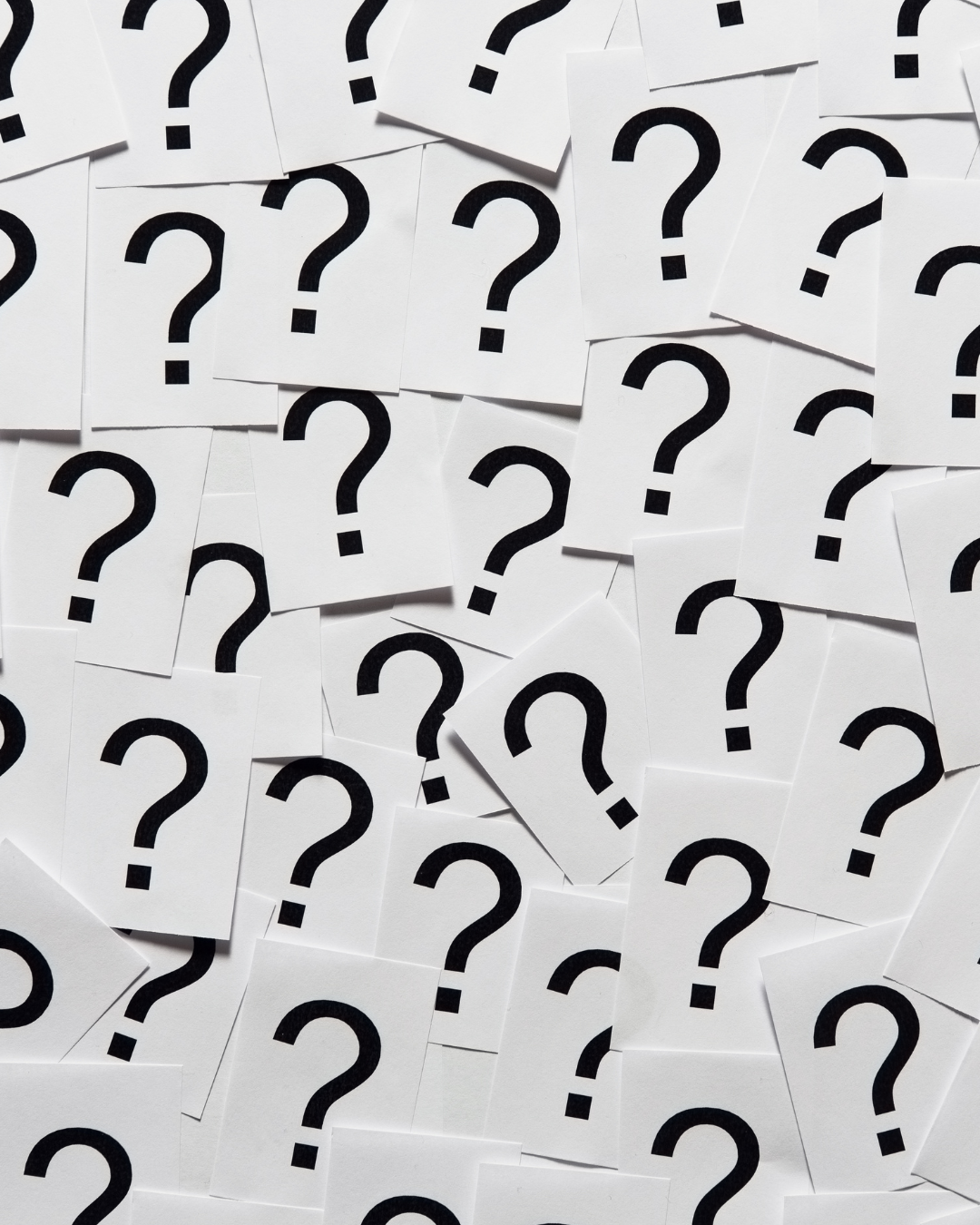 Pattern of question marks on white background